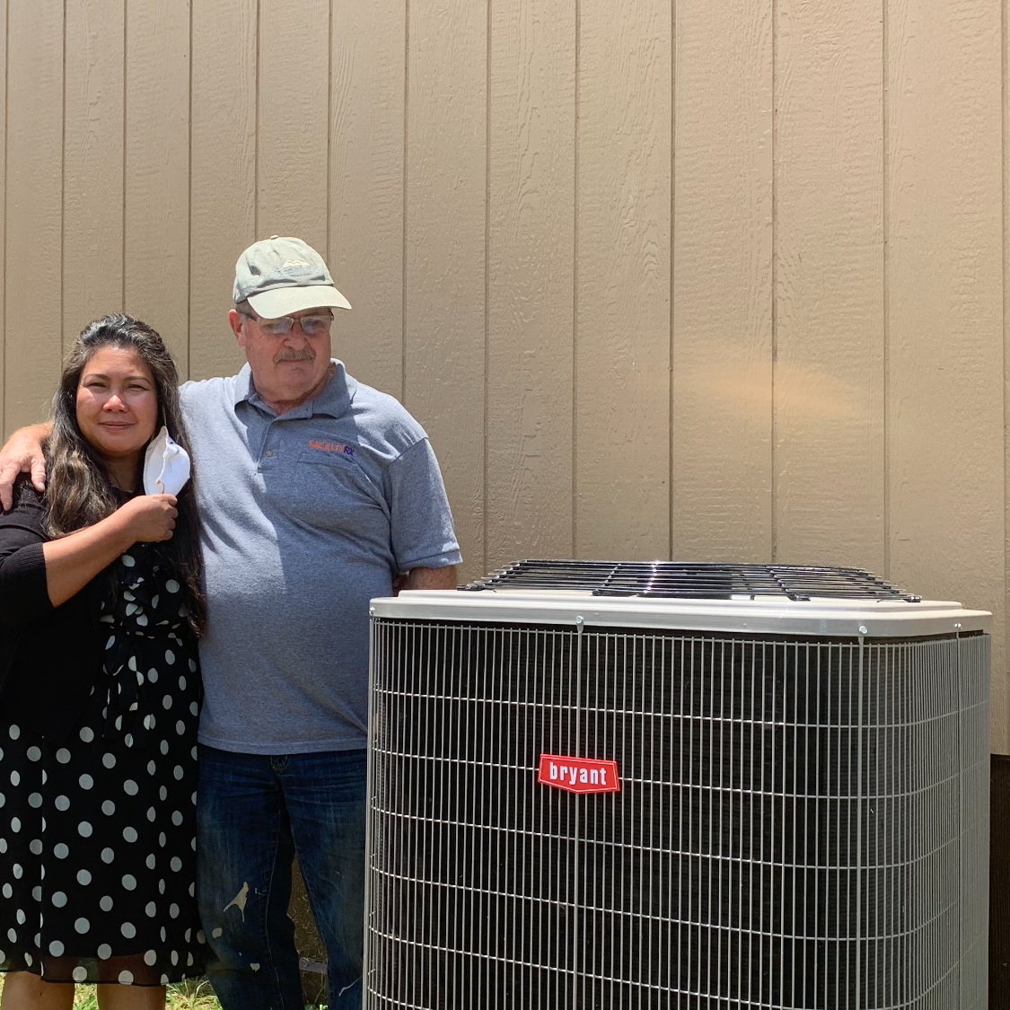 Robert and Allison with a new Bryant AC installation